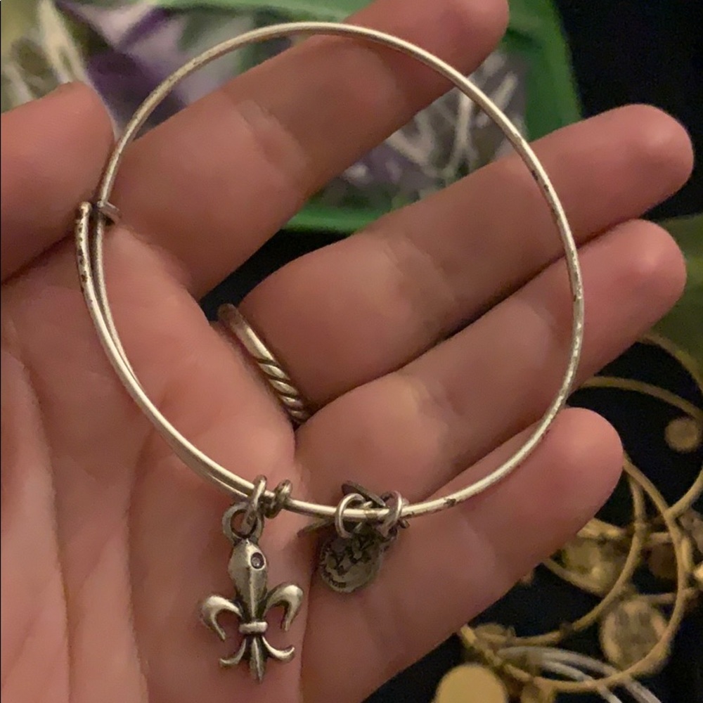 Silver Alex and Ani bracelet with fleur de lis